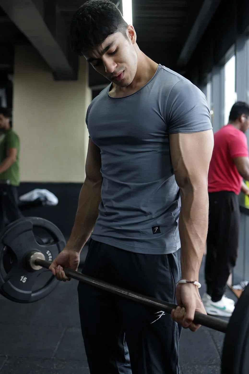 Grey Legacy Scoop Neck T-shirt by Fuaark NZ, showcasing a comfortable fit and classic design on a plain background.