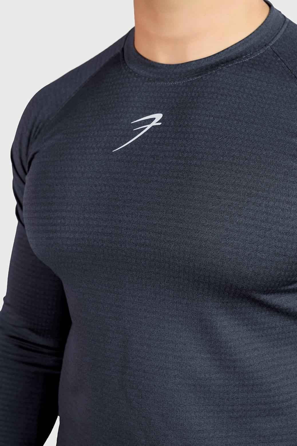 Fuaark NZ midnight dark grey long sleeve T-shirt made of ultra-soft cotton with a tailored fit, shown on a model.