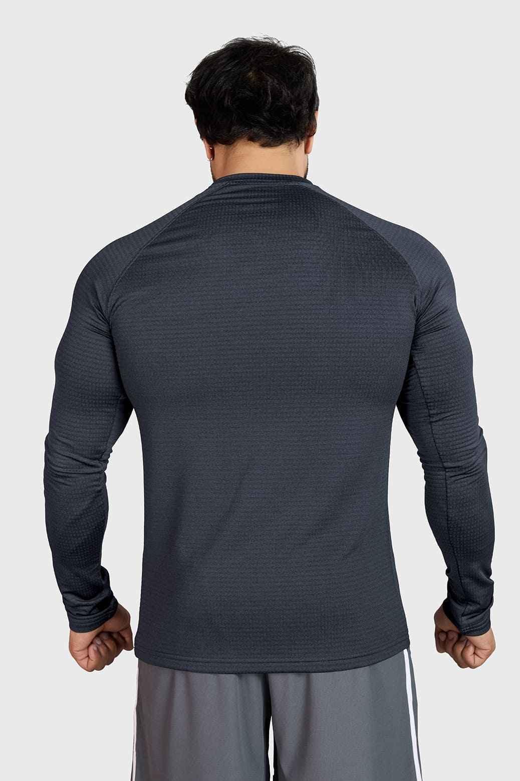 Fuaark NZ Midnight Dark Grey long sleeve T-shirt made of ultra-soft cotton with a tailored fit, displayed on a hanger.