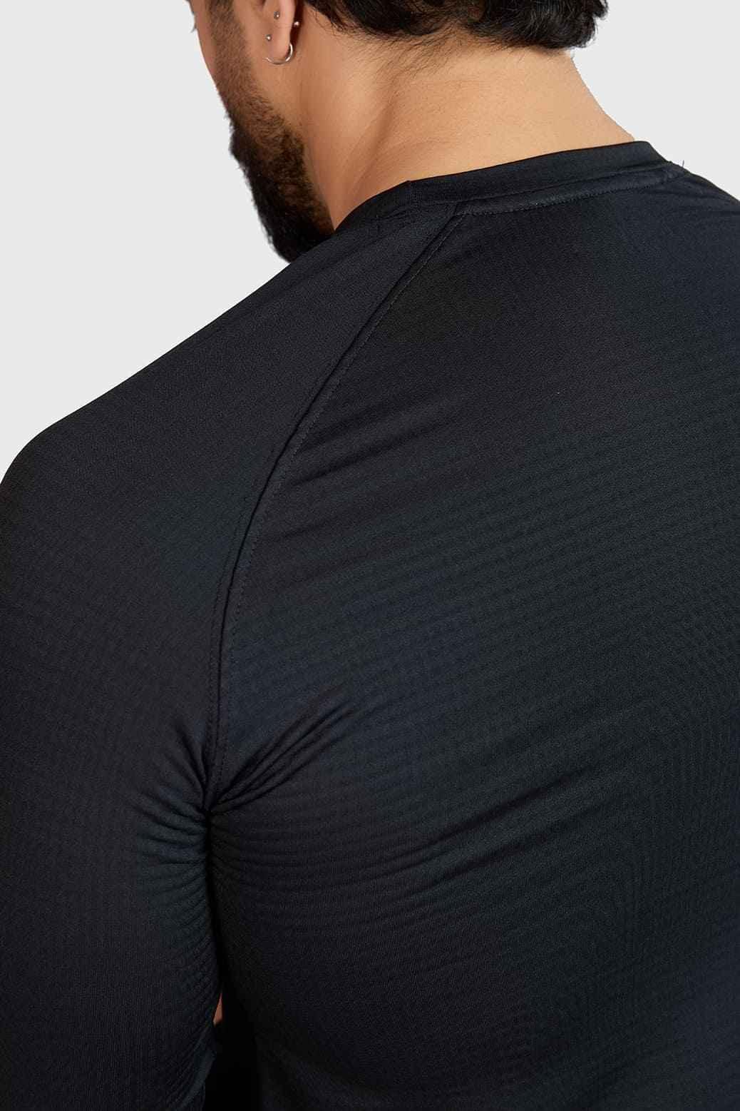Black full-sleeve T-shirt by Fuaark Nz featuring a comfortable fit and sleek style, perfect for casual wear.