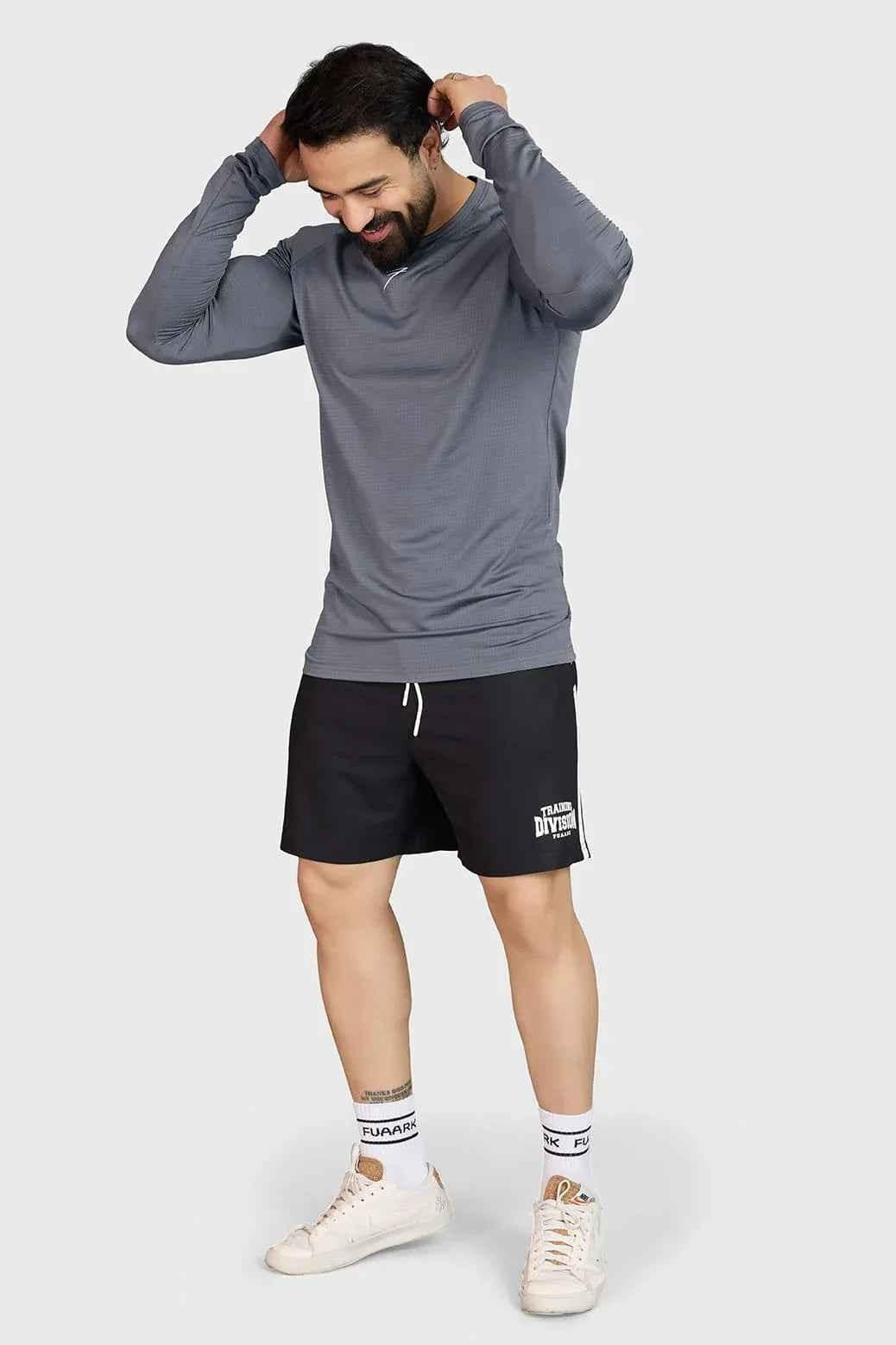 Light grey Midnight full-sleeves T-shirt by Fuaark Nz, shown on a hanger with a casual fit and soft fabric texture.