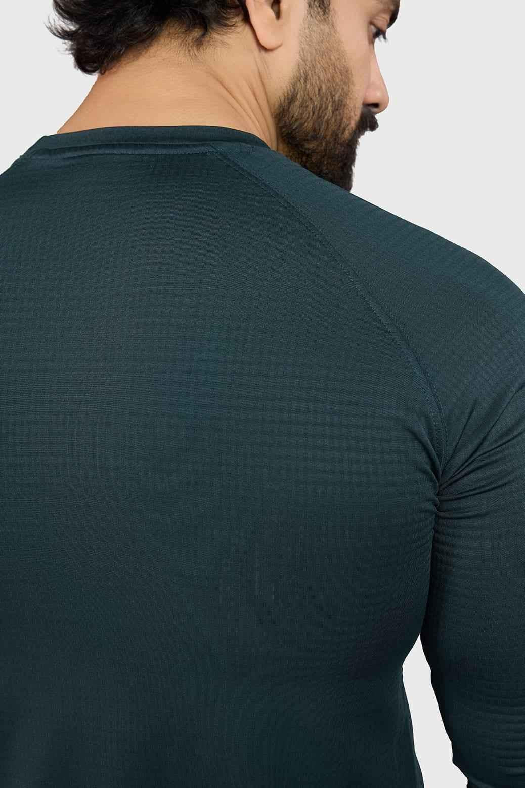 Sea green Fuaark Nz full-sleeves T-shirt with a casual fit, displayed on a plain background.
