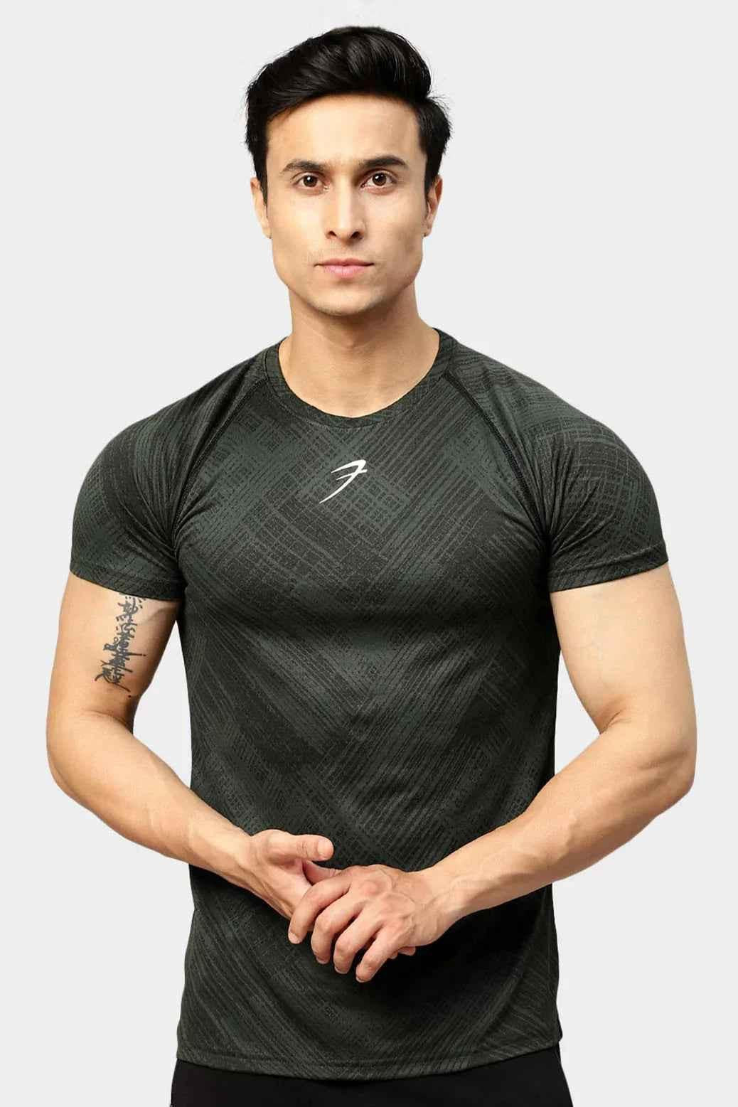 Green Ozone Jacquard T-shirt by Fuaark Nz, featuring detailed jacquard pattern on cotton fabric.