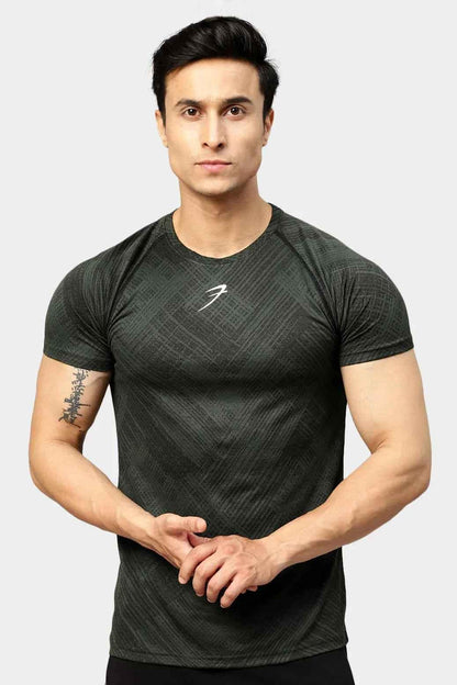 Green Ozone Jacquard T-shirt by Fuaark Nz, featuring detailed jacquard pattern on cotton fabric.