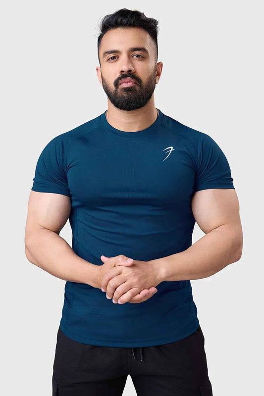 Teal performance T-shirt by Fuaark Nz featuring a fitted design and breathable fabric for active wear.