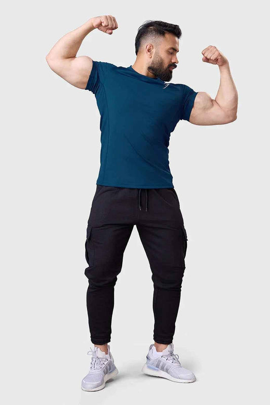 Teal performance T-shirt by Fuaark Nz featuring a comfortable fit and sporty design, shown on a plain background.