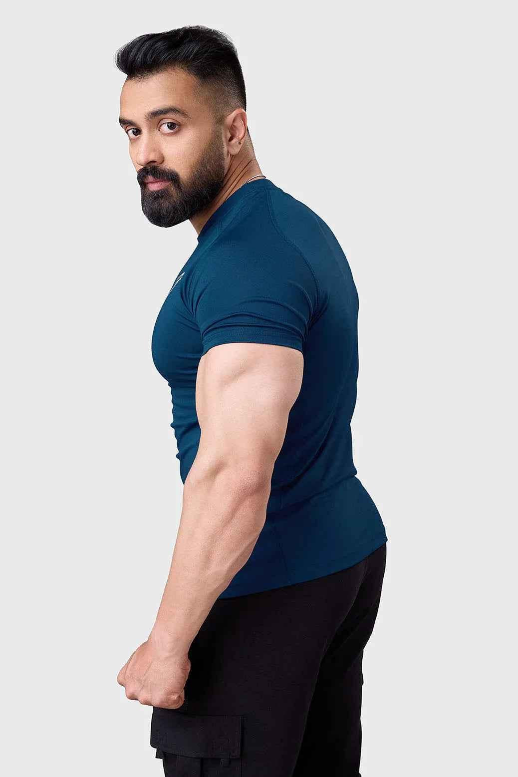 Fuaark Nz teal performance T-shirt for men, lightweight and breathable, shown flat with short sleeves and round neckline.