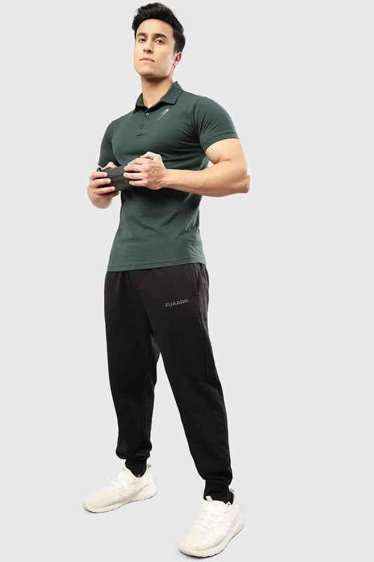 Green Polo T-shirt by Fuaark Nz, casual men's short-sleeve t-shirt with collar and button detail, shown on a white background.