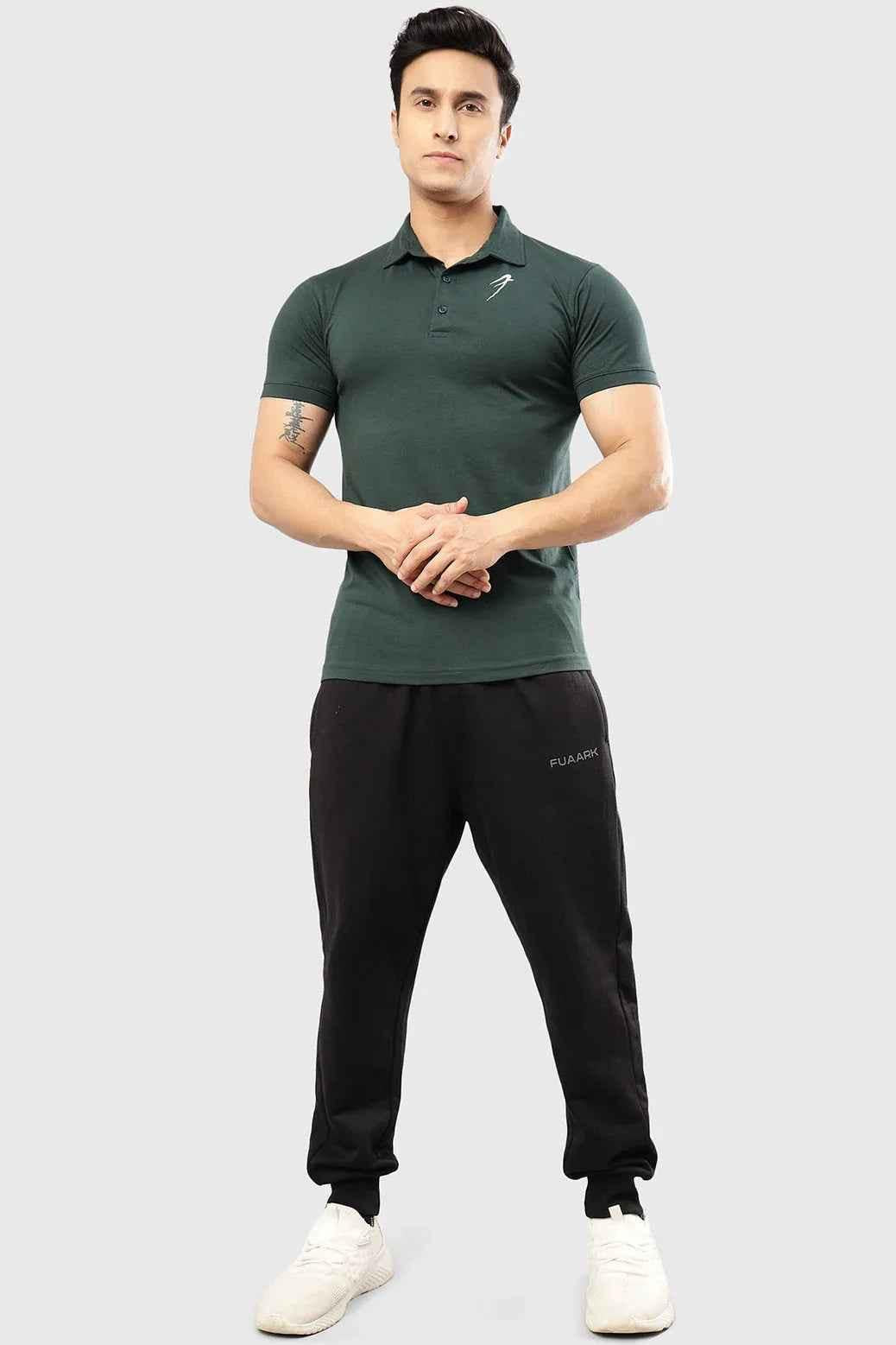 Green Polo T-shirt from Fuaark Nz featuring a classic fit and collar, shown on a plain background.