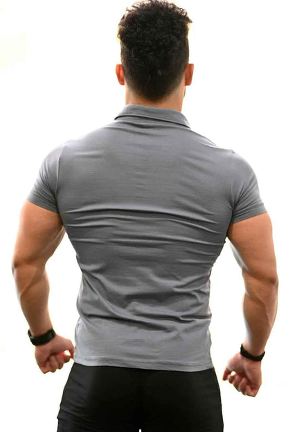 Grey Polo T-shirt by Fuaark Nz, showcasing a classic fit with a collar and short sleeves on a plain background.