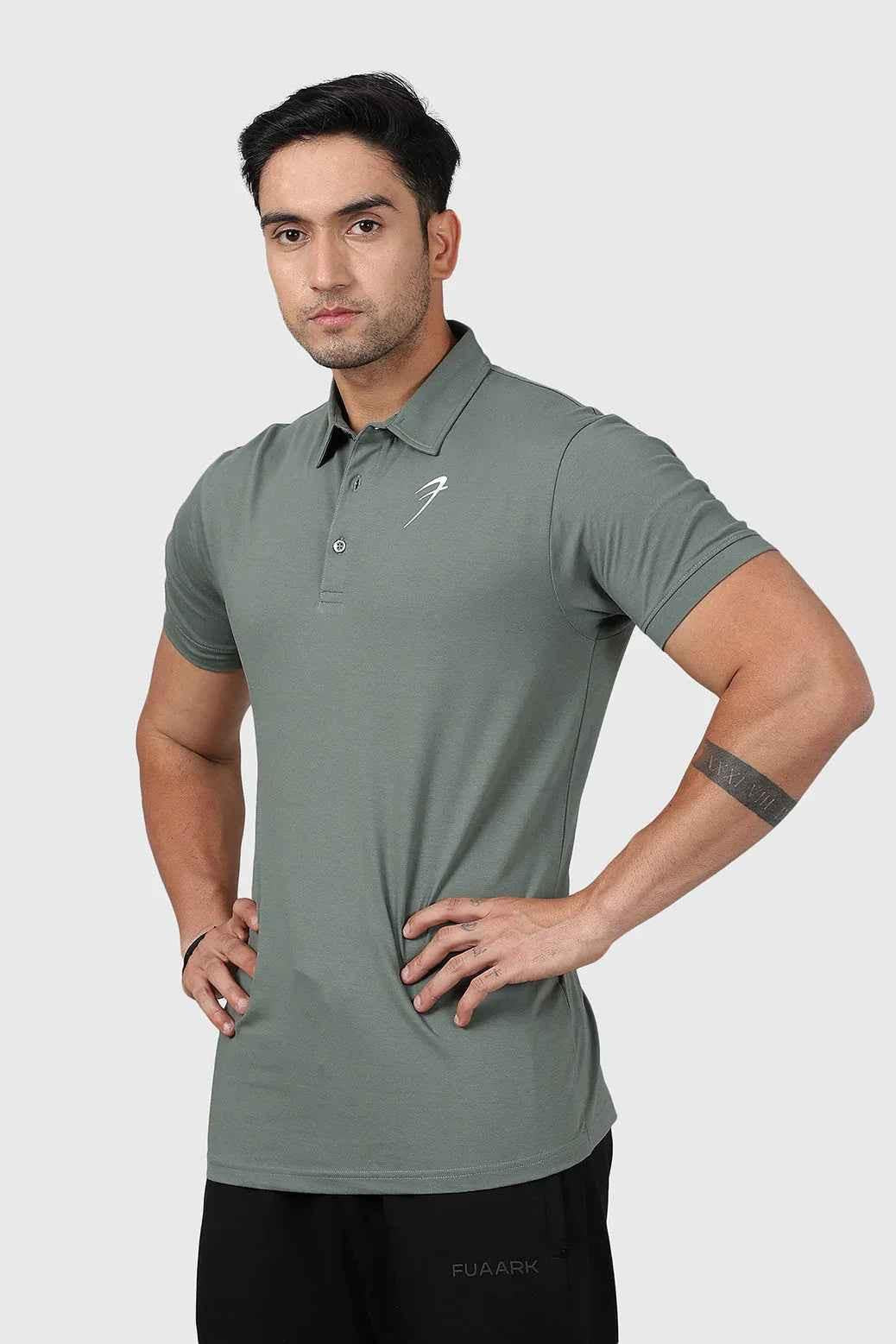 Sage green Polo T-shirt from Fuaark Nz featuring a classic fit and short sleeves, displayed flat on a plain background.