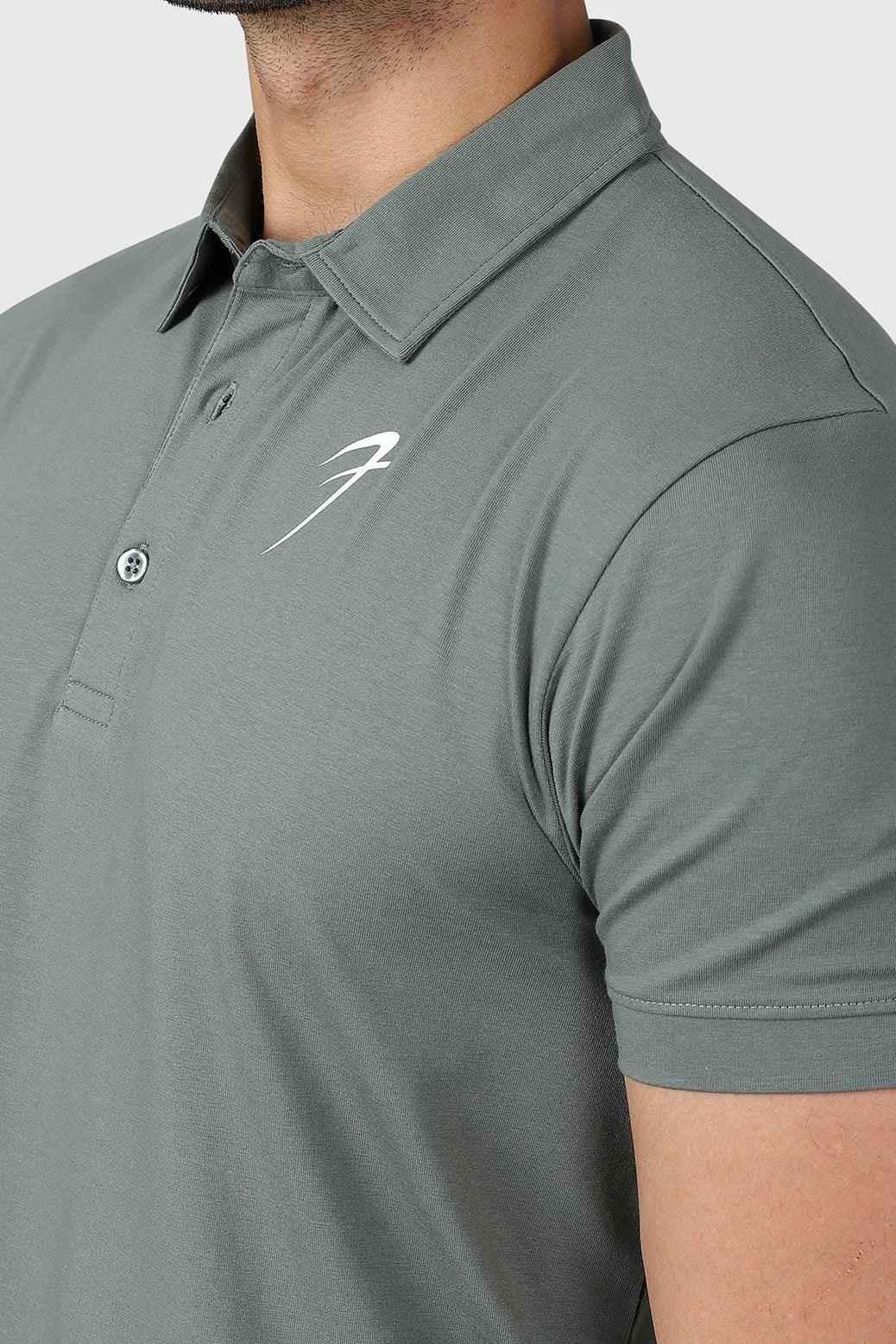 Fuaark Nz Polo T-shirt in sage green, casual men's t-shirt with a classic fit and short sleeves, displayed on a white background.