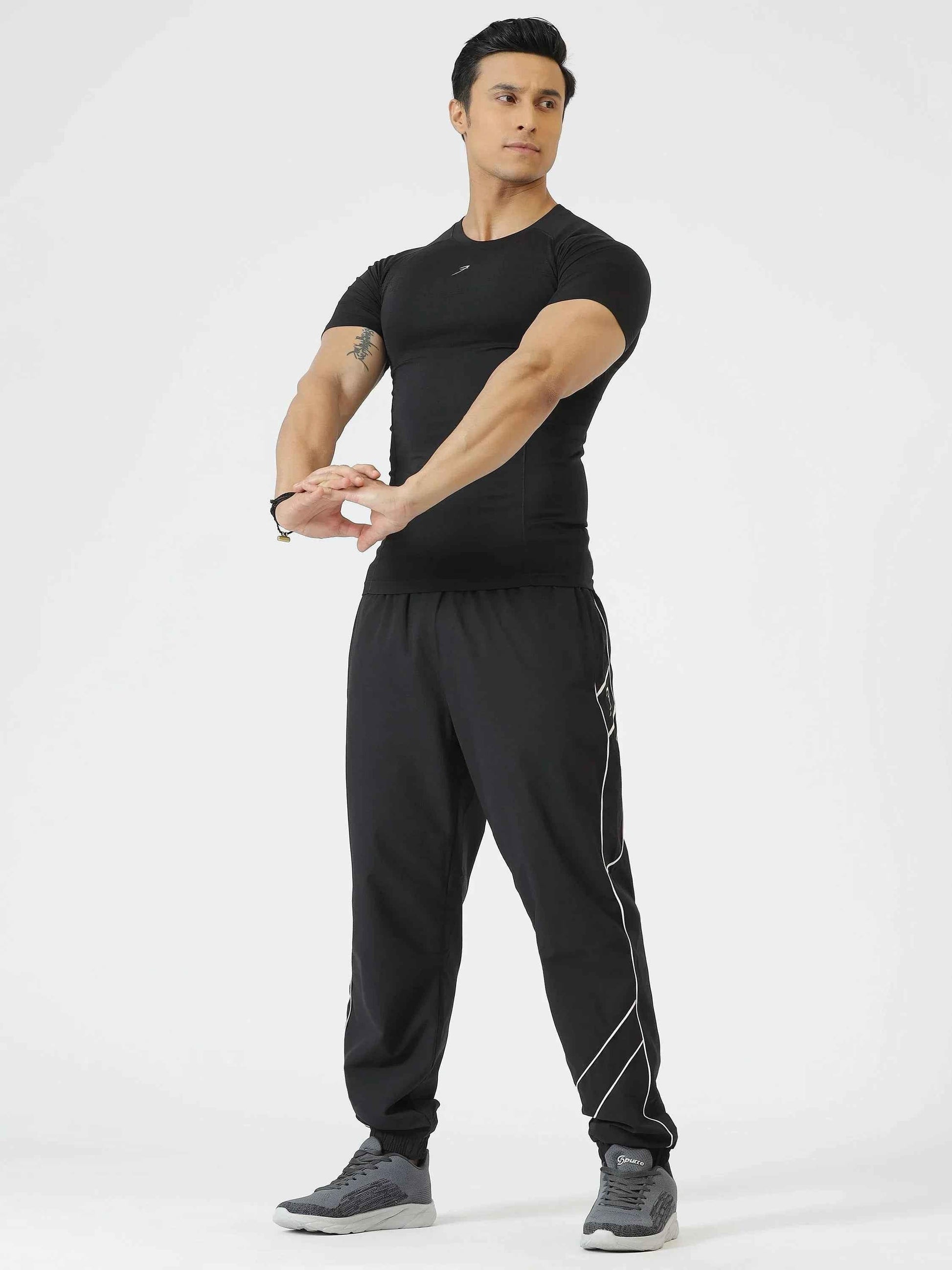 Fuaark Nz Power Black seamless workout T-shirt with moisture-wicking fabric and 4-way stretch for comfort during exercise