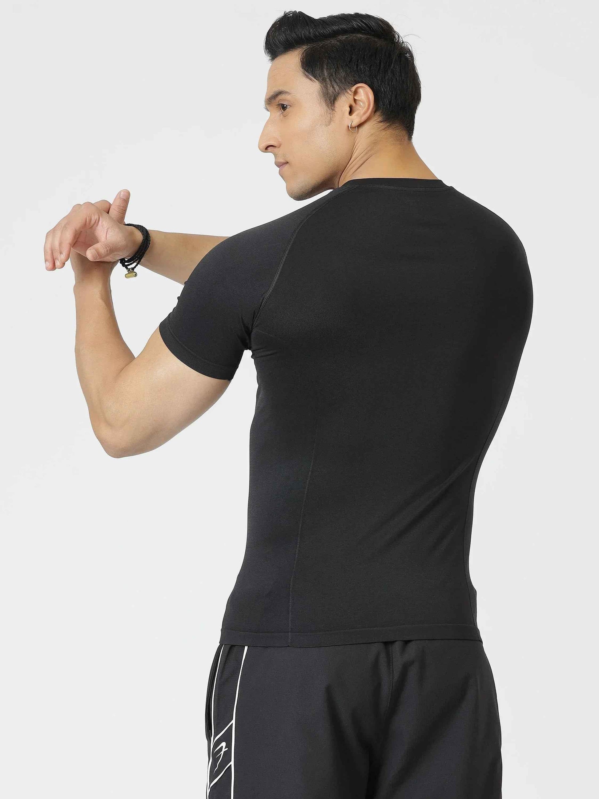 Fuaark Nz Power Black Seamless Workout T-Shirt for men, moisture-wicking, 4-way stretch, designed for active fitness and comfort.