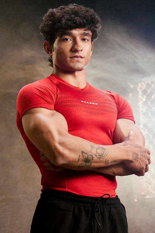 Red Fuaark NZ Power Seamless T-shirt displayed on a mannequin, highlighting its fitted, smooth fabric and sporty design.