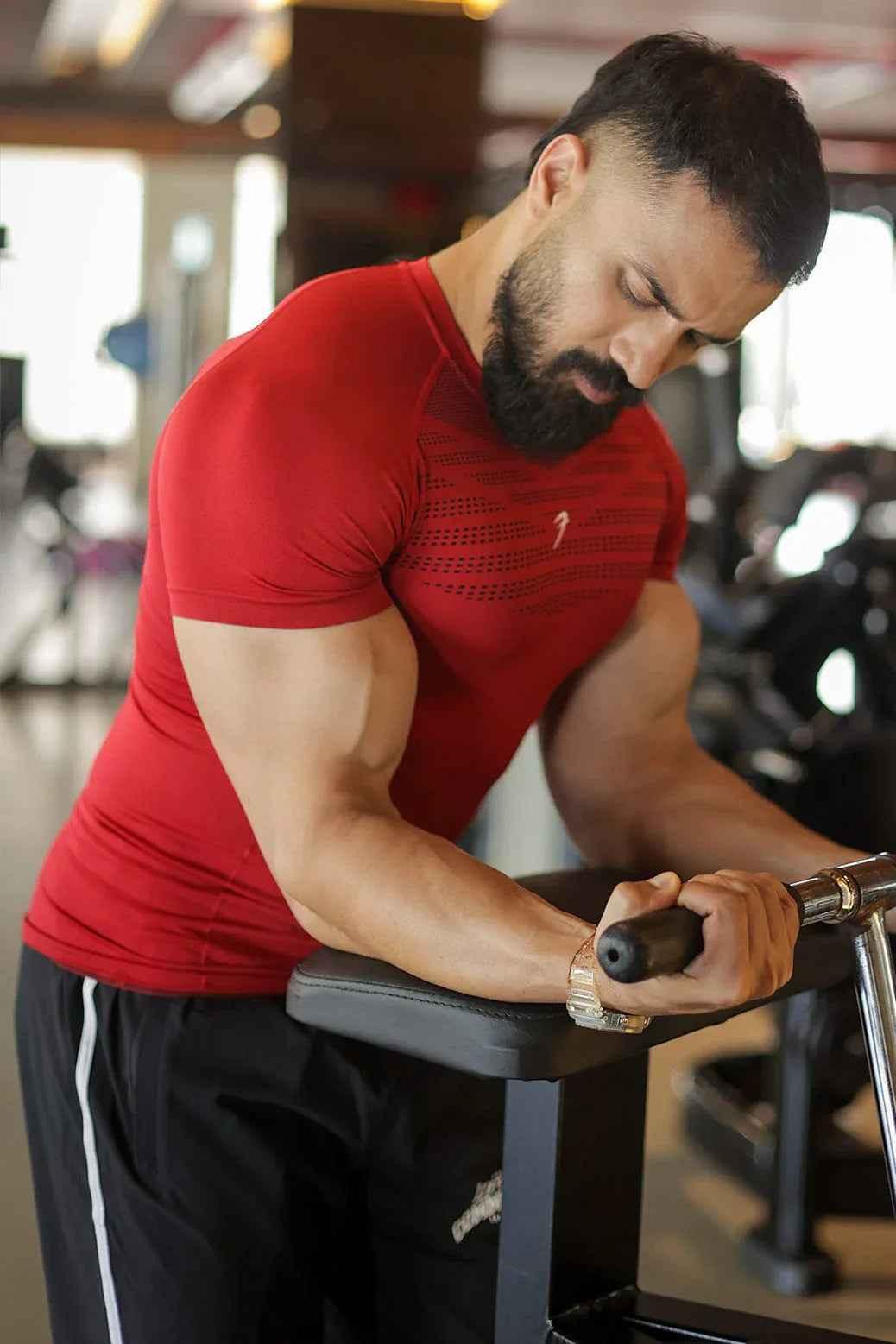 Red Fuaark Nz Power Seamless T-shirt with logo, close-up of soft fabric and fitted design.