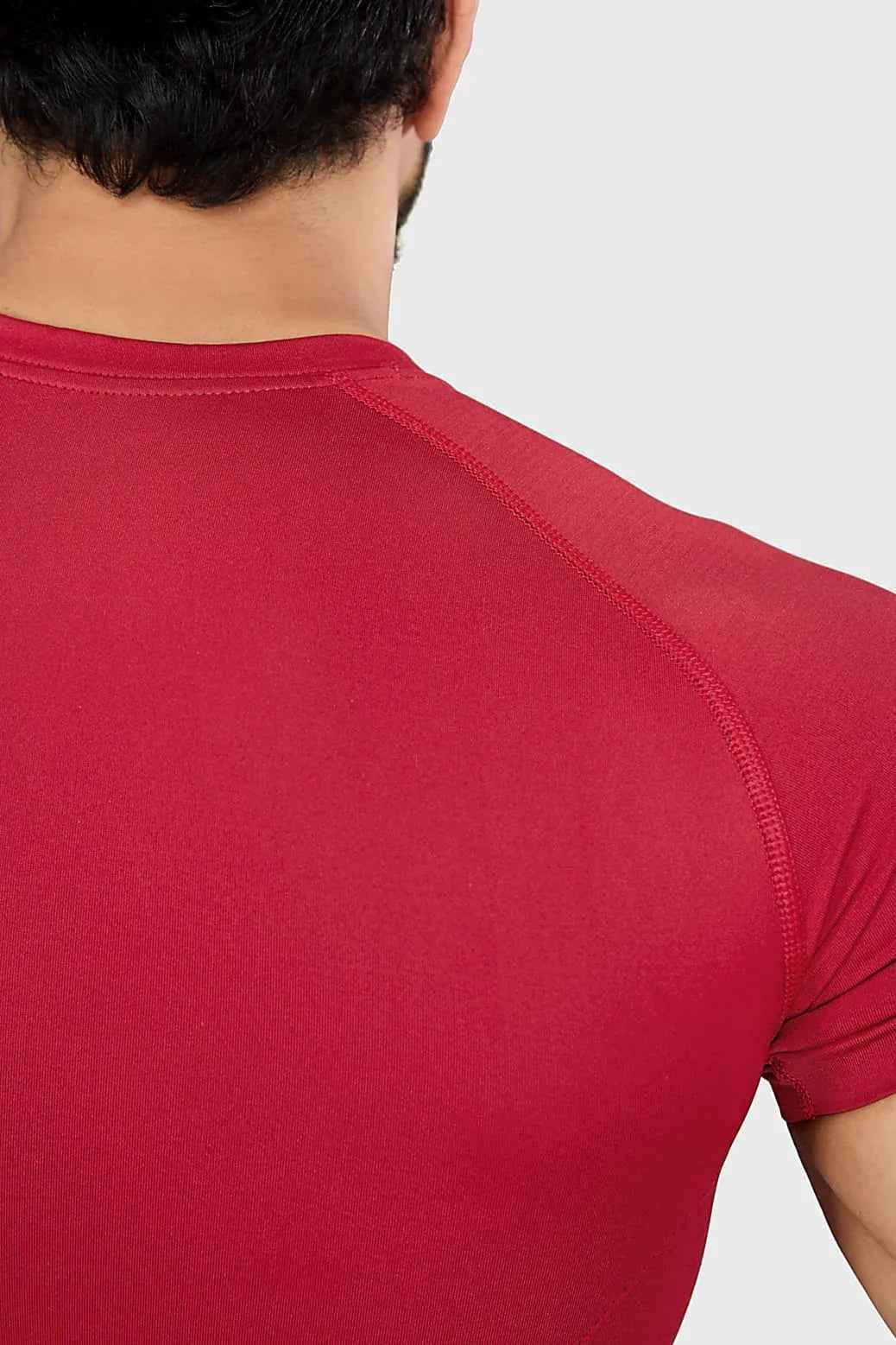 Red Fuaark NZ Power Seamless T-shirt with logo, casual fit, soft fabric, and short sleeves.