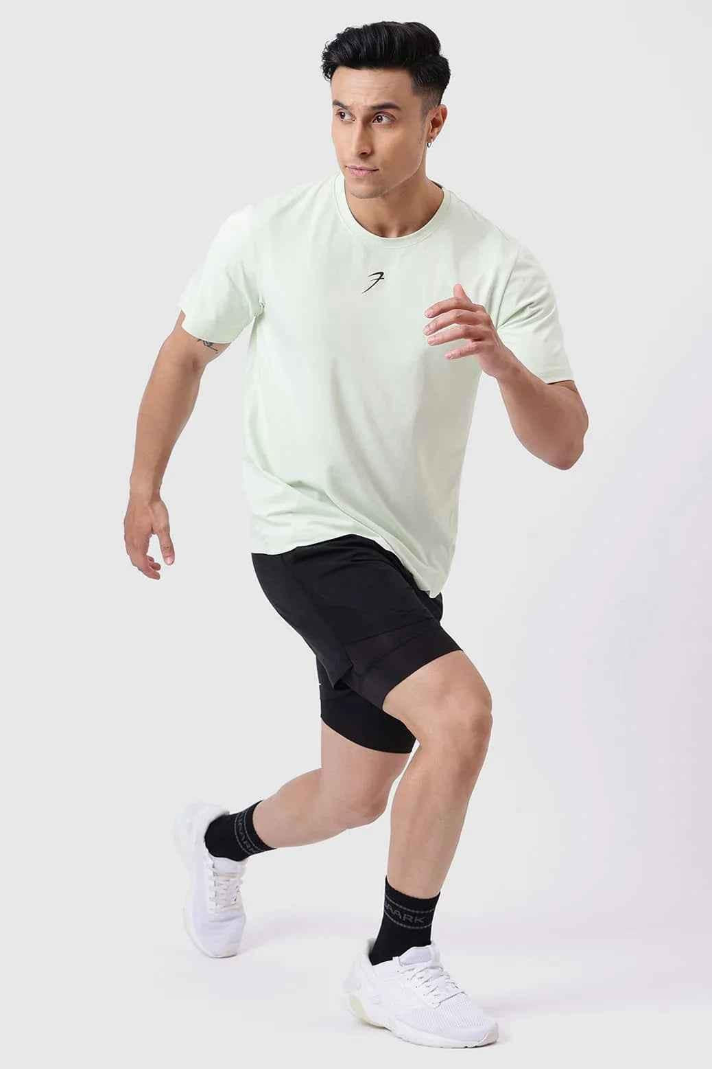 Fuaark Nz Pulse Light Green Running T-Shirt for men, made of breathable fabric, designed for comfort and performance during exercise.
