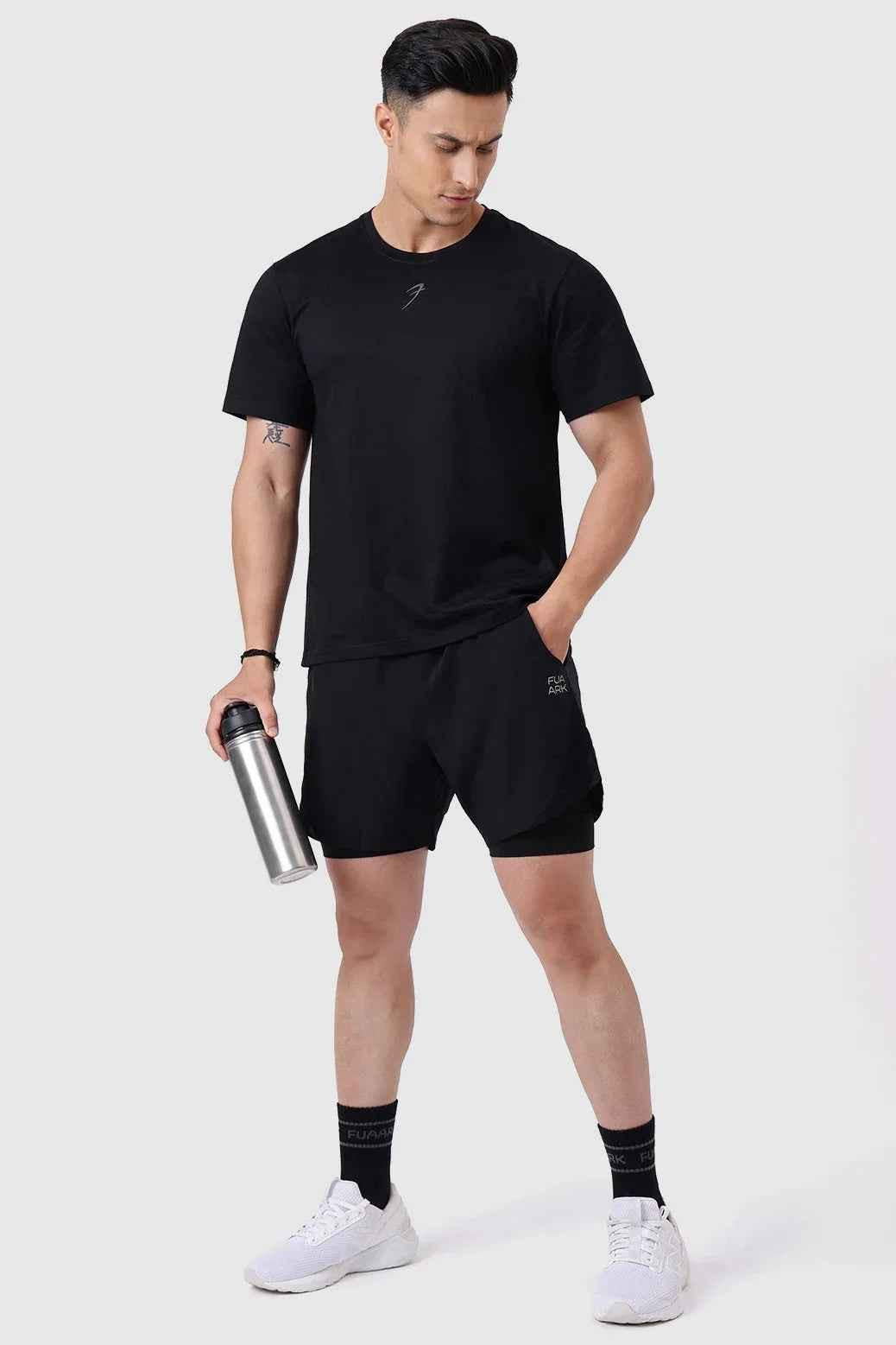 Black Pulse Running T-shirt by Fuaark Nz, made from lightweight fabric, displayed flat with short sleeves and round neckline.