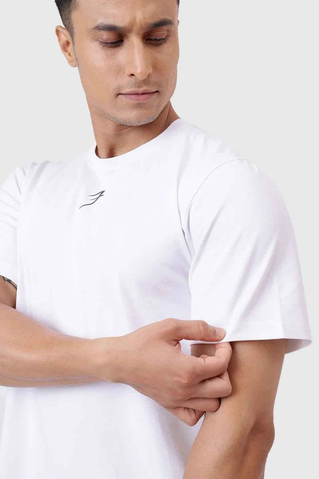 White Pulse Running T-shirt by Fuaark Nz, showcasing a lightweight, breathable athletic T-shirt with the brand logo on the chest.