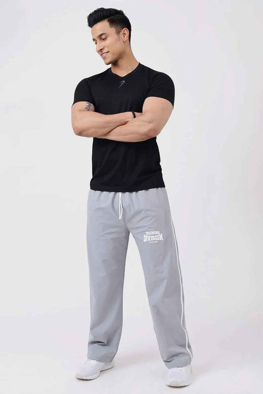 Black Pulse T-shirt by Fuaark Nz, featuring a casual fit and logo design, displayed flat on a white background.