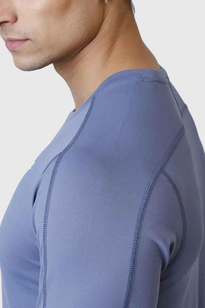 Light grey Rush full-sleeves T-shirt by Fuaark NZ, featuring a comfortable fit and casual style in a close-up image.