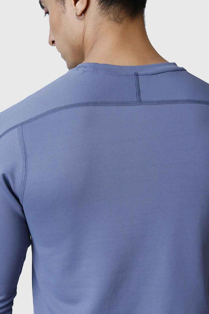 Light grey Rush full-sleeves T-shirt by Fuaark NZ, shown on a model, featuring a comfortable fit and casual style.