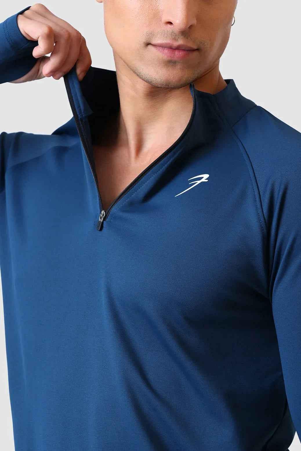 Teal Rush Pullover T-shirt by Fuaark Nz featuring a casual fit and soft fabric, displayed flat on a white background.