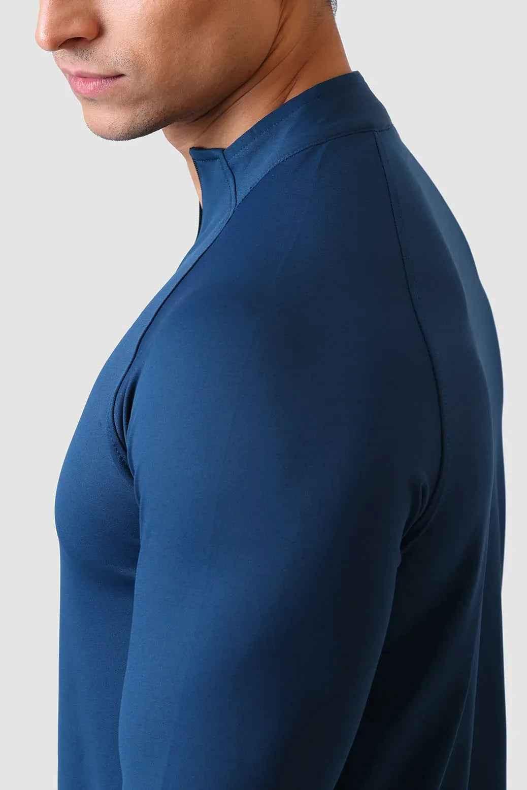 Fuaark NZ teal Rush Pullover T-shirt displayed flat, showcasing its soft fabric and casual fit.