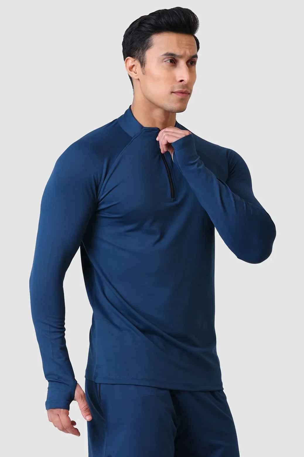 Fuaark Nz teal Rush Pullover T-shirt displayed on a hanger, showcasing soft fabric and casual style.