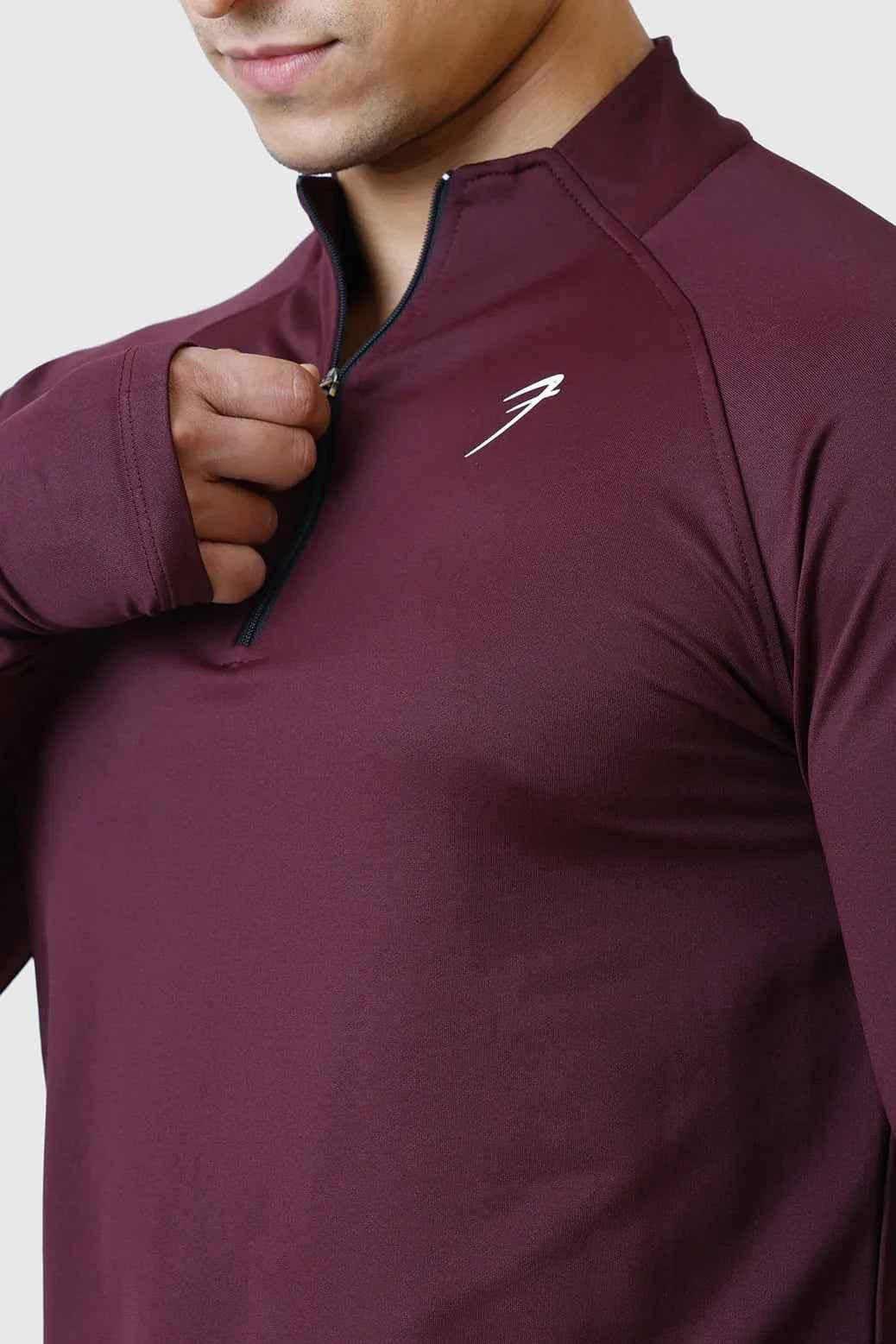 Fuaark NZ Rush Pullover Wine T-shirt displayed on a mannequin, showcasing the stylish wine-colored casual tee.