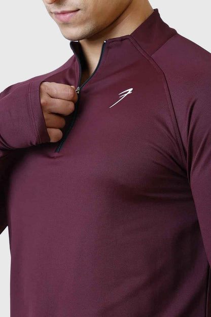 Fuaark NZ Rush Pullover Wine T-shirt displayed on a mannequin, showcasing the stylish wine-colored casual tee.