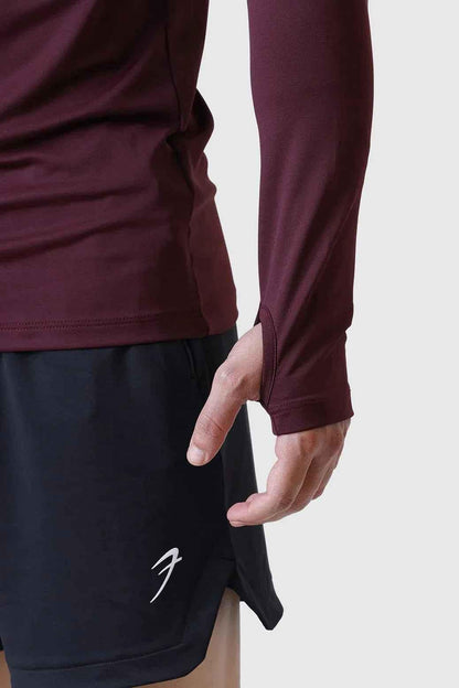 Fuaark NZ Rush Pullover Wine T-shirt in maroon, featuring a comfortable fit and stylish design, shown on a plain background.