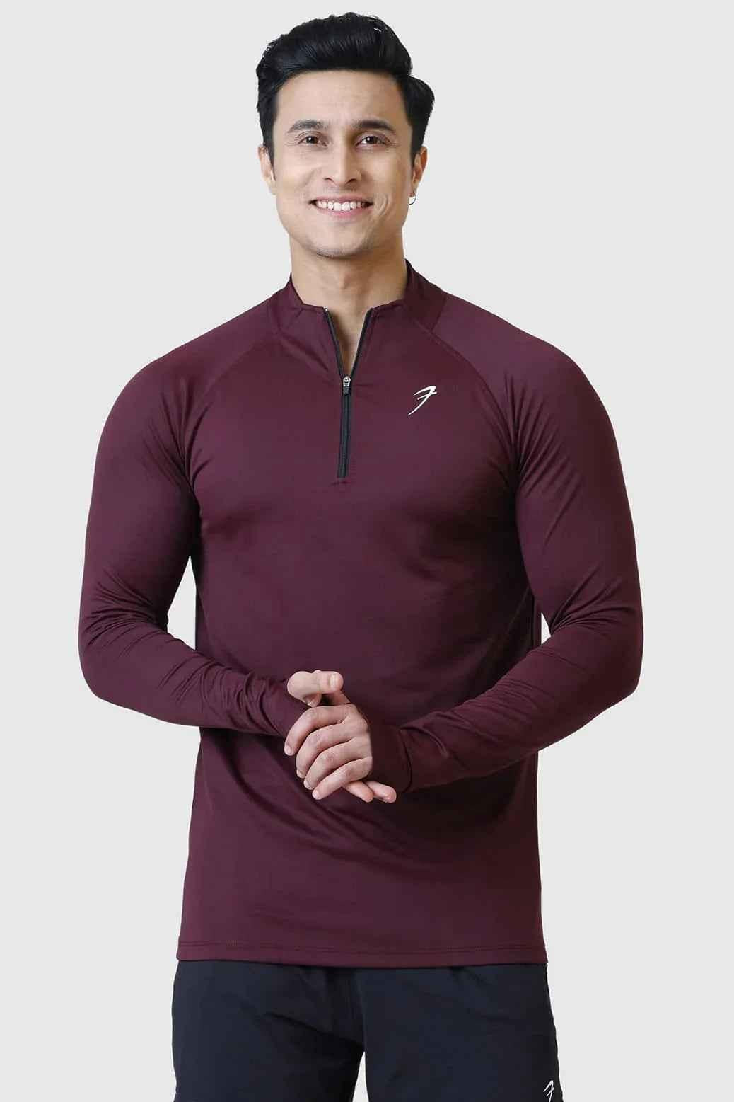Fuaark Nz Rush Pullover Wine T-shirt showing a relaxed fit with the brand logo on a wine-colored fabric.