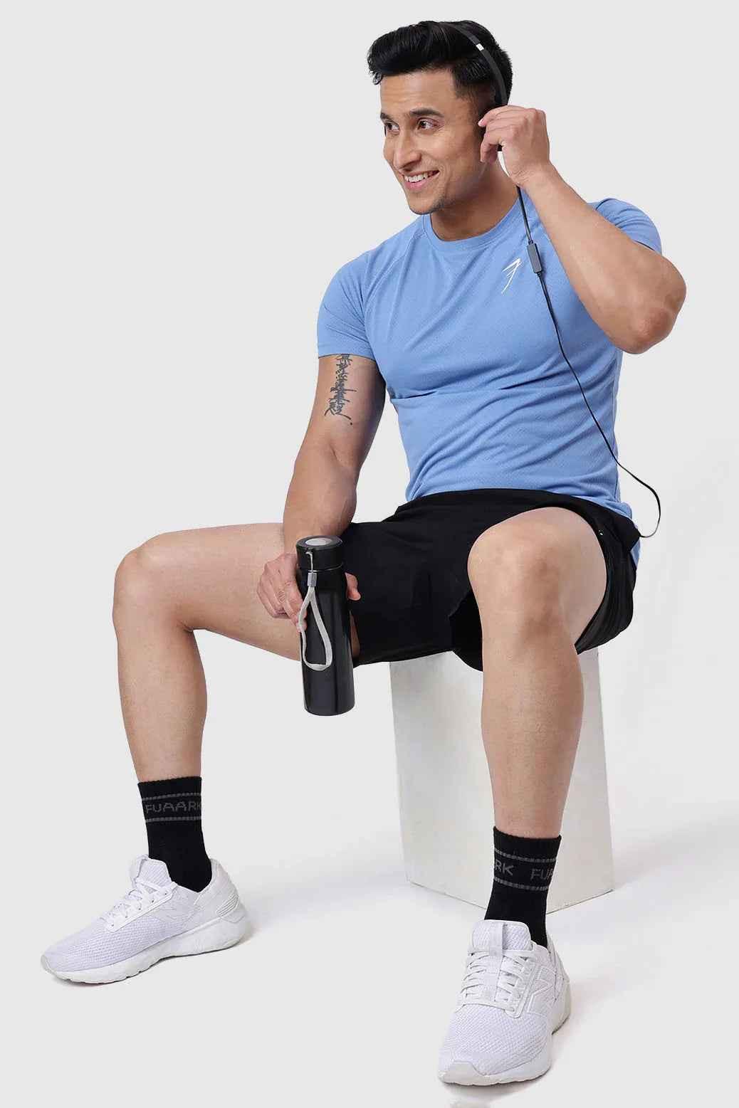 Light blue Slate T-shirt by Fuaark Nz featuring a comfortable fit and casual style, shown on a plain background.