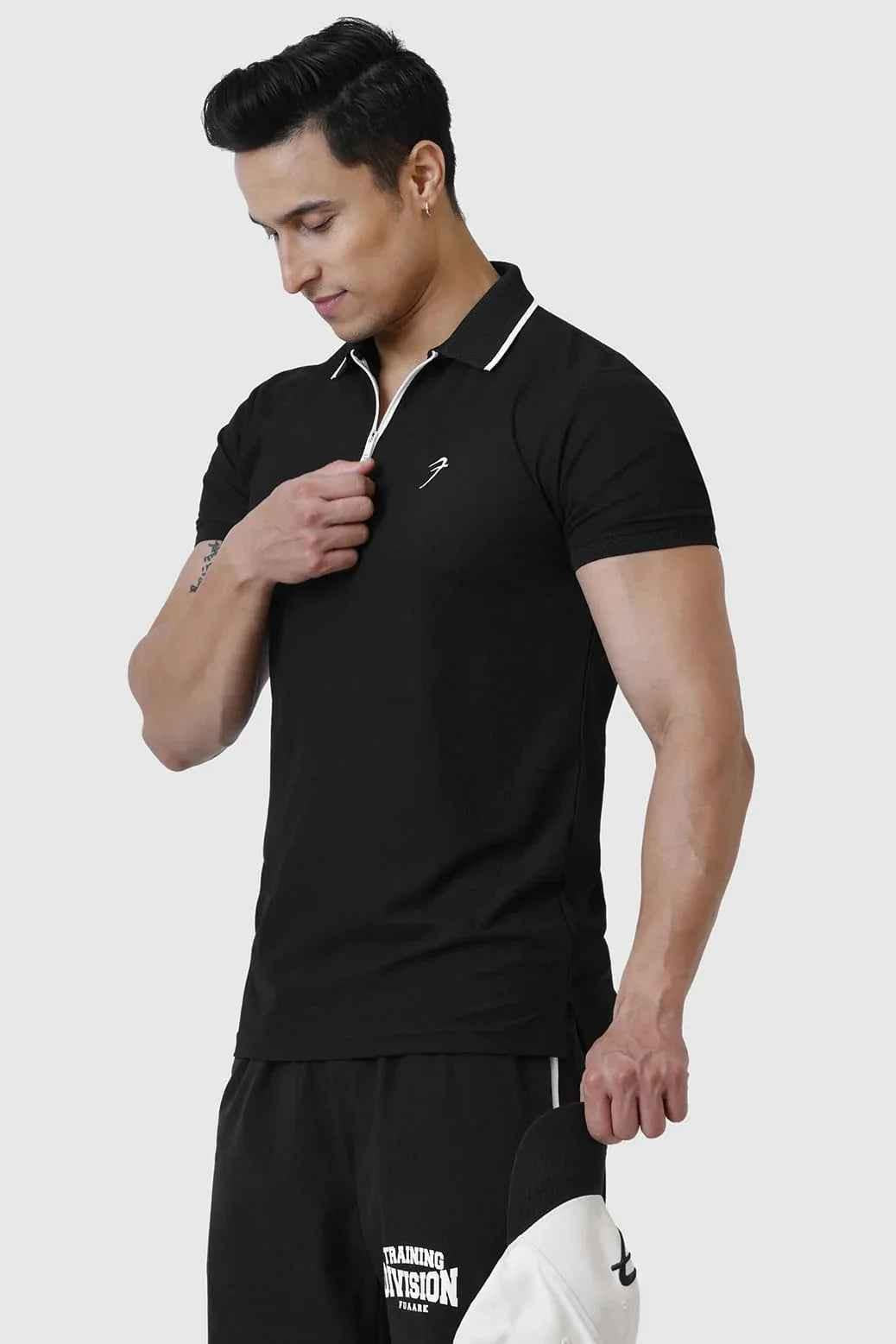 Black Fuaark Nz Stride Polo T-shirt displayed flat, showcasing its classic design and soft fabric for casual wear.