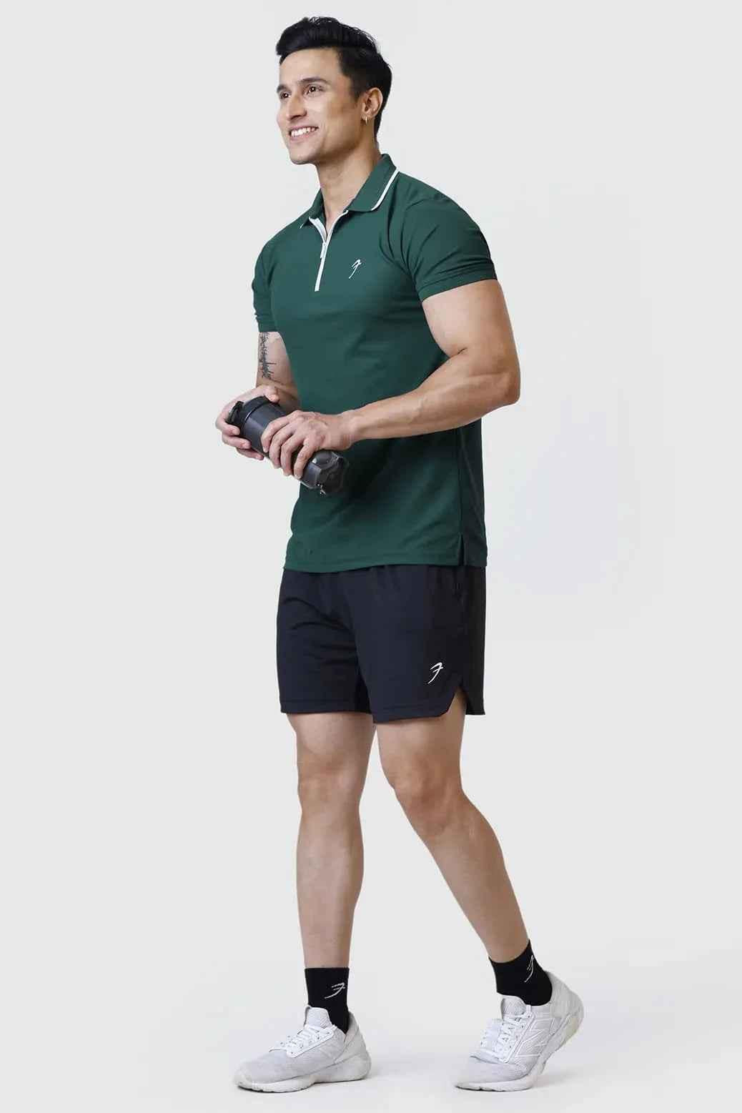 Green Fuaark Nz Stride Polo T-shirt displayed flat with short sleeves and collar, showcasing a casual, stylish men's T-shirt.