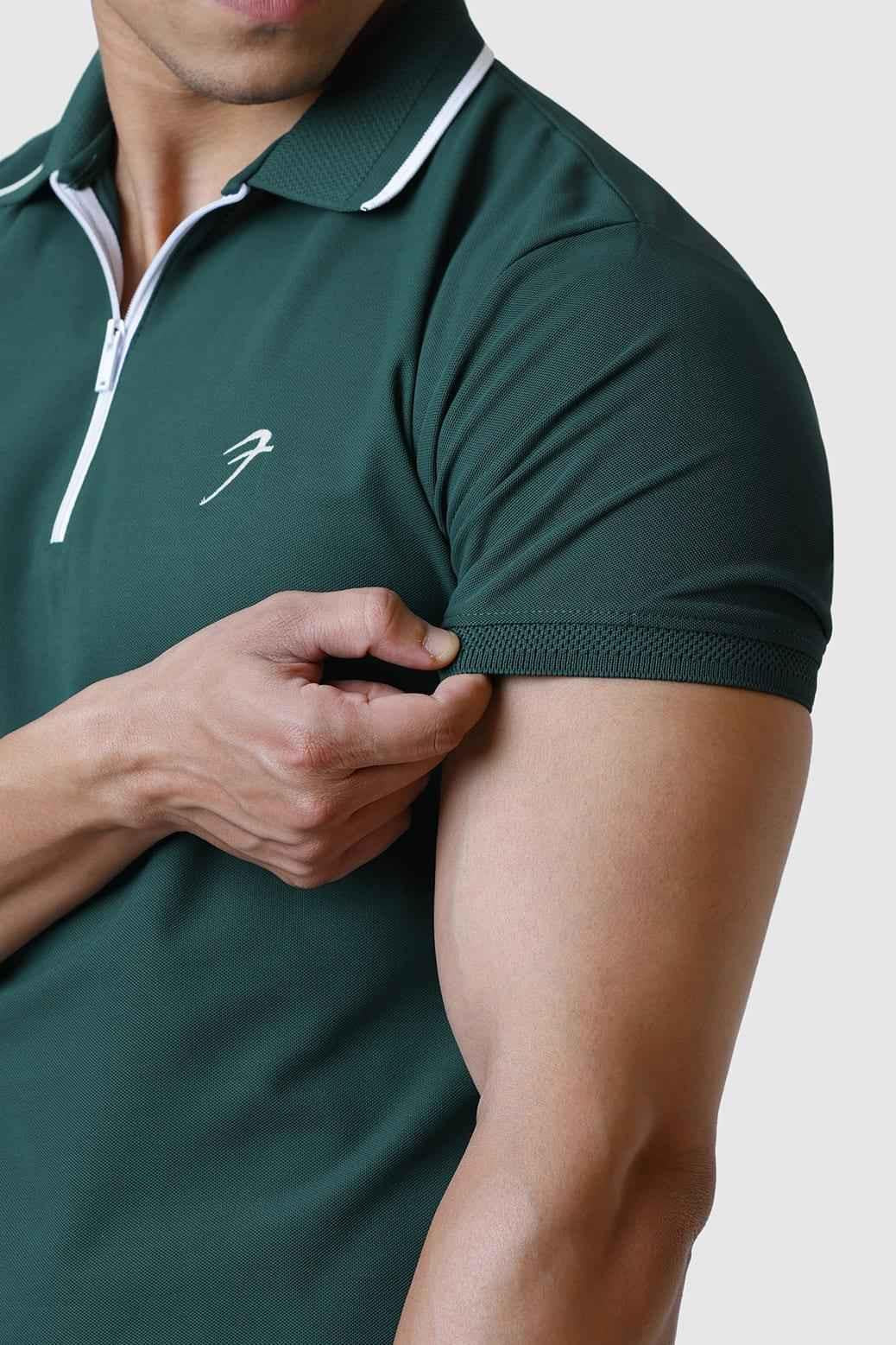 Green Fuaark Nz Stride Polo T-shirt, casual short-sleeve shirt with a classic collar and logo detail, displayed flat on a neutral background.