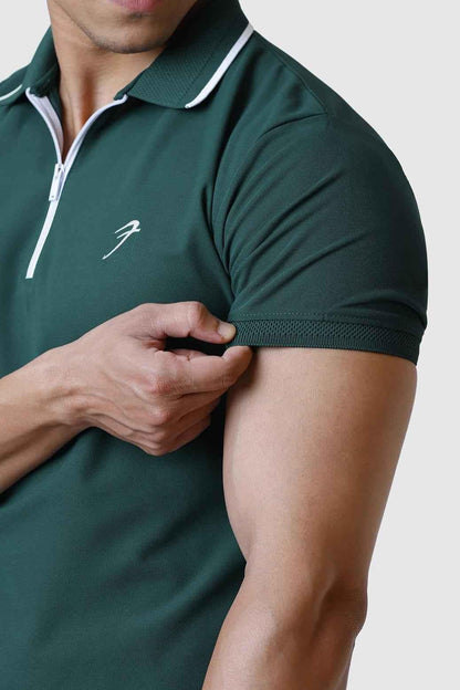 Green Fuaark Nz Stride Polo T-shirt, casual short-sleeve shirt with a classic collar and logo detail, displayed flat on a neutral background.