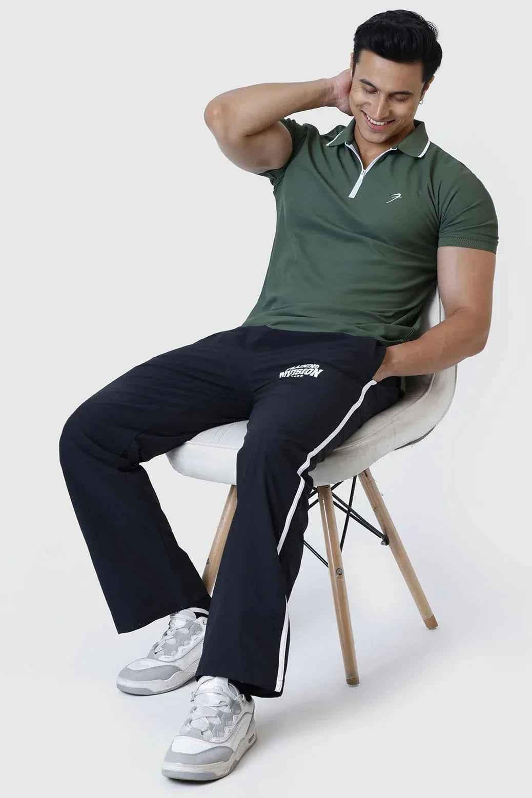 Olive green Fuaark NZ Stride Polo T-shirt, casual men's short-sleeve shirt with collar and button placket, laid flat.