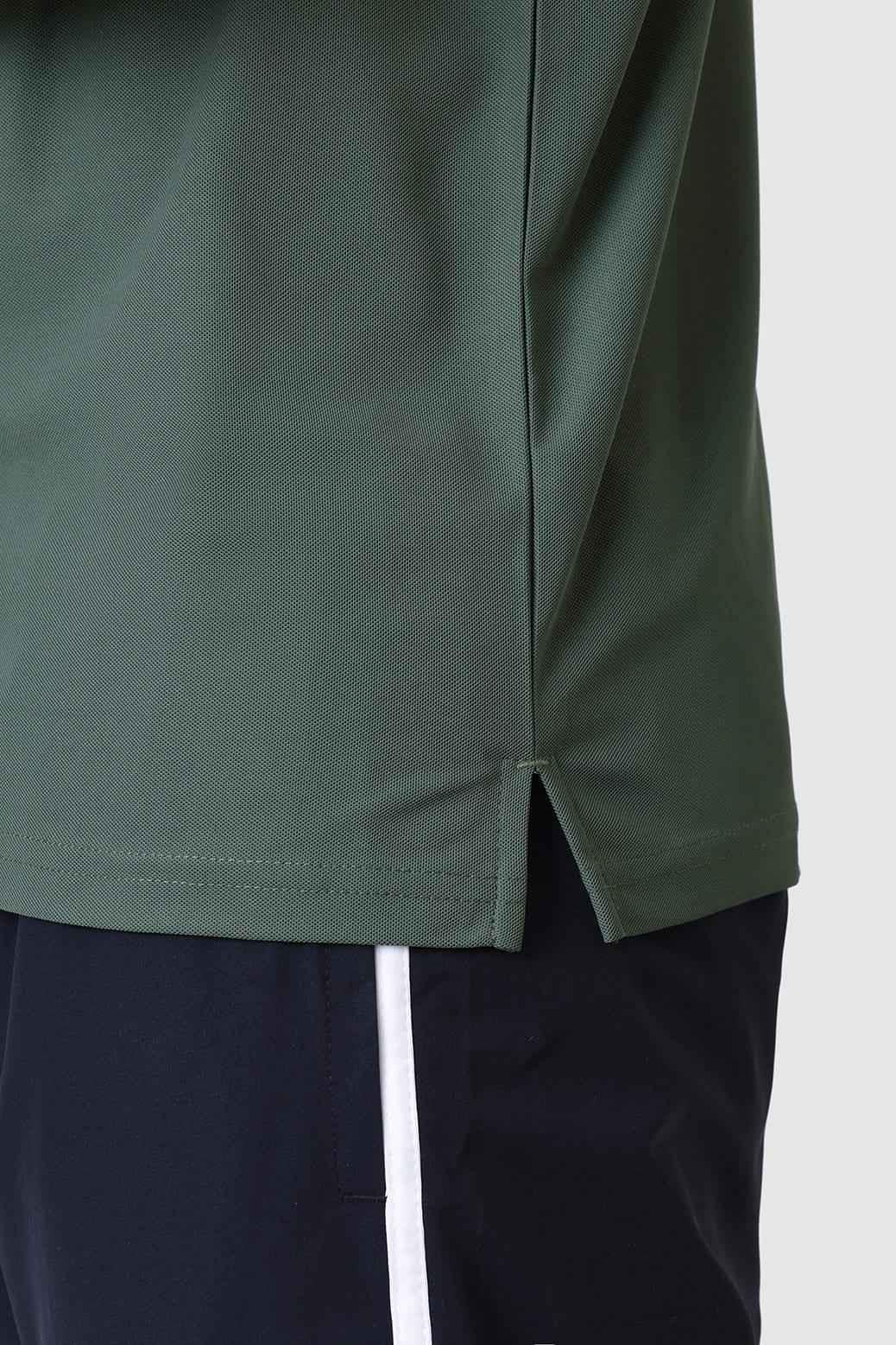 Olive green Fuaark Nz Stride Polo T-shirt featuring a classic collar and short sleeves, displayed flat on a white background.