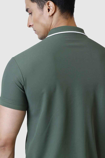 Olive green Fuaark Nz Stride Polo T-shirt laid flat, showcasing short sleeves and classic collar.