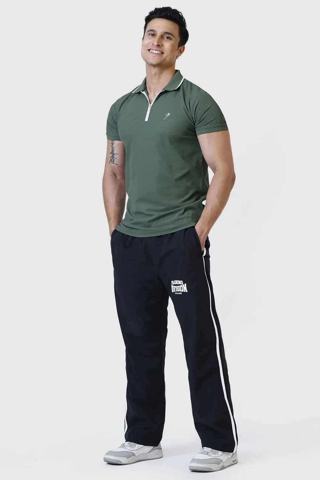 Fuaark Nz Stride Polo T-shirt in olive green, casual fit, with collar and short sleeves, displayed on a hanger.