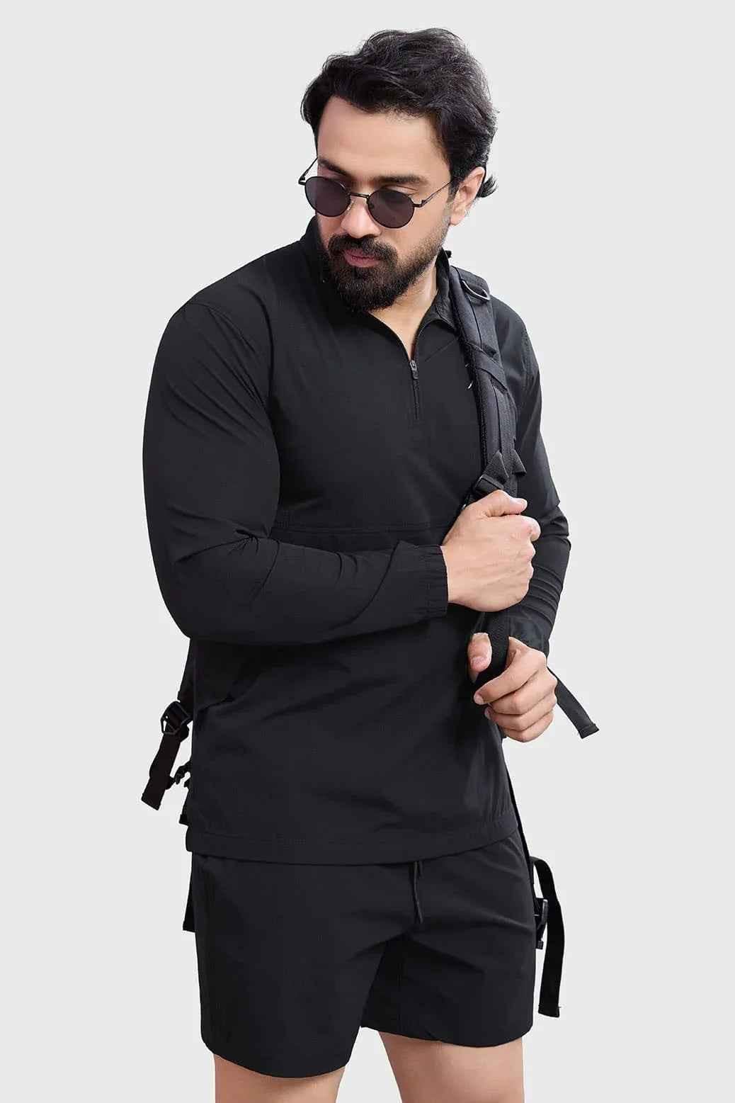 Black Fuaark Nz T-shirt with a threaded pullover design, featuring a comfortable fit and casual style.