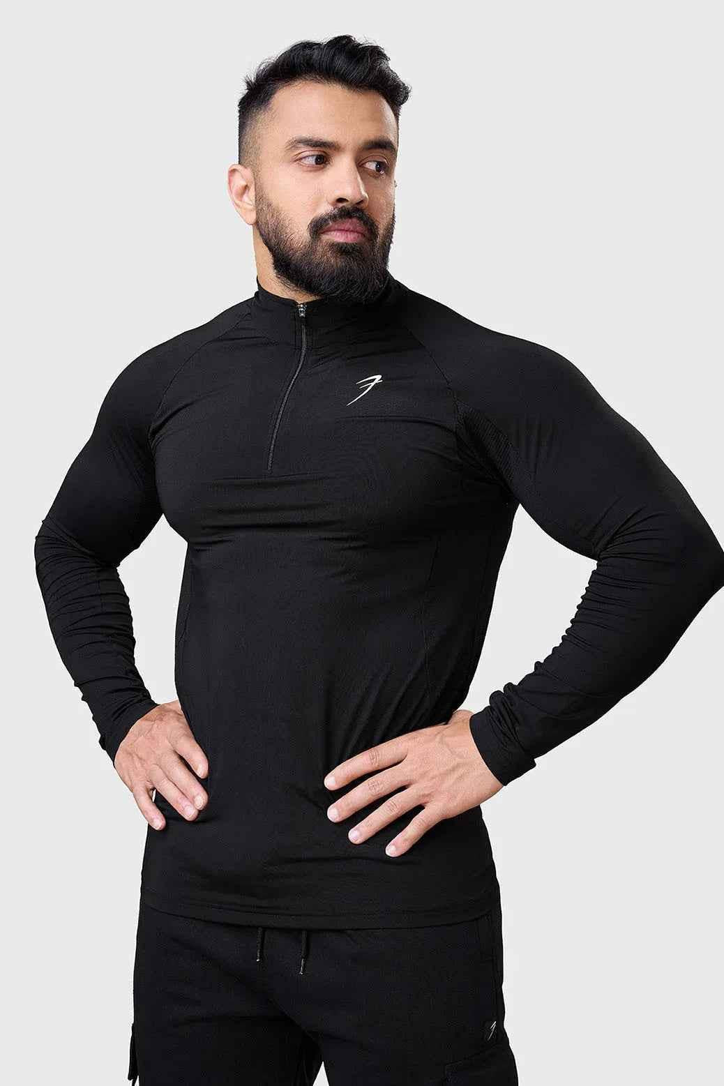 Black Thrive pullover T-shirt by Fuaark NZ, featuring a comfortable fit and simple design, shown on a plain background.
