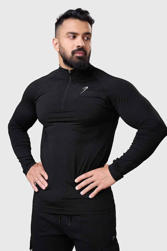 Black Thrive pullover T-shirt by Fuaark NZ, featuring a comfortable fit and simple design, shown on a plain background.