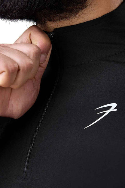 Black Thrive pullover T-shirt by Fuaark NZ, shown flat with front view, soft fabric and classic fit.