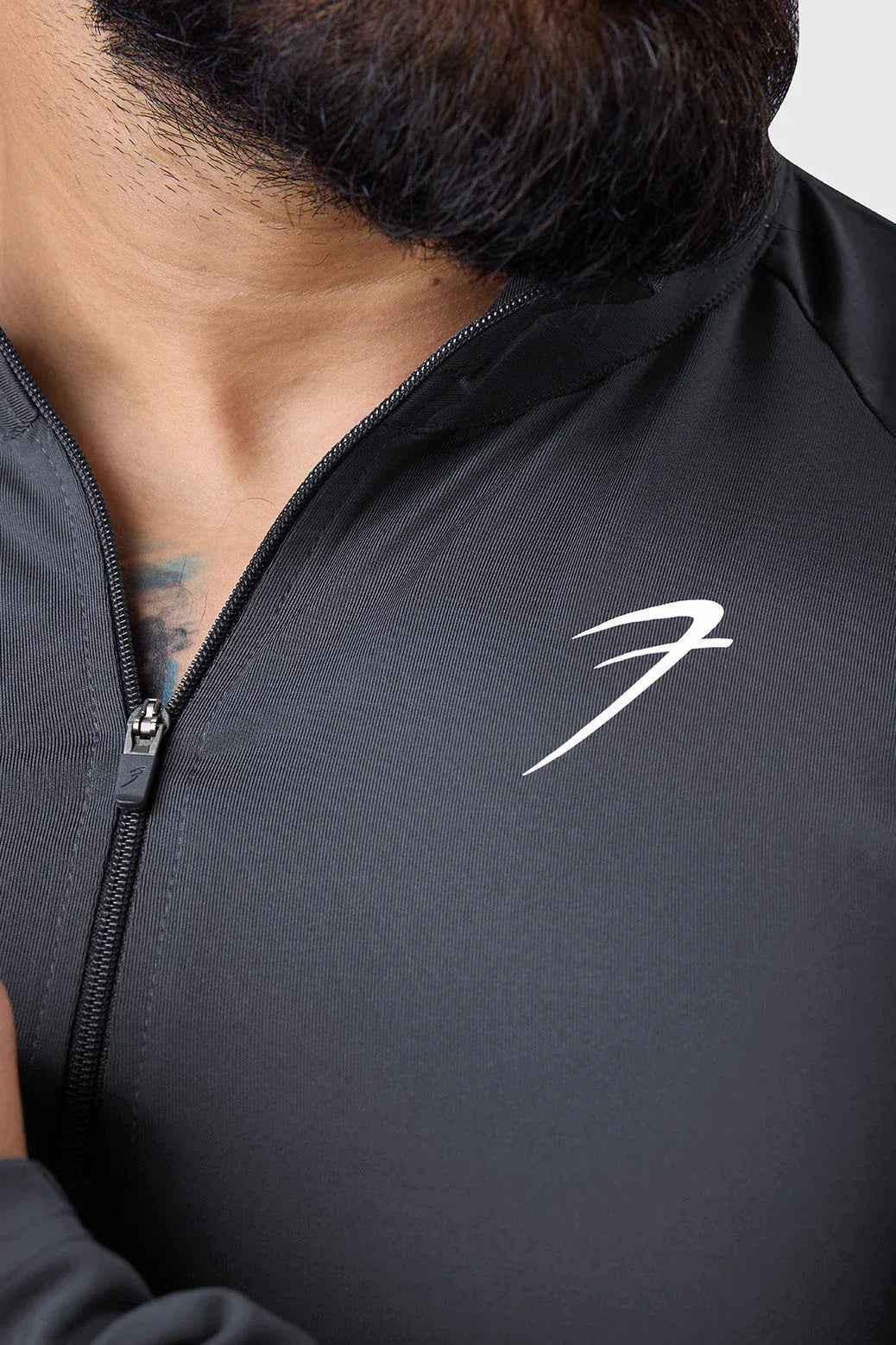 Grey Thrive pullover T-shirt by Fuaark NZ, featuring a comfortable fit and casual style, shown on a plain background.