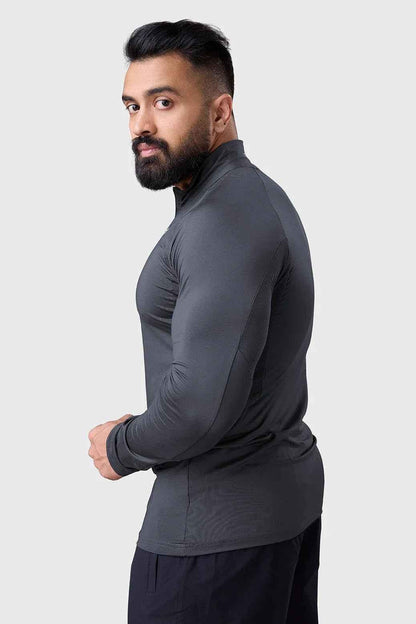 Grey Thrive pullover T-shirt by Fuaark Nz featuring a comfortable fit and casual style, shown on a model.