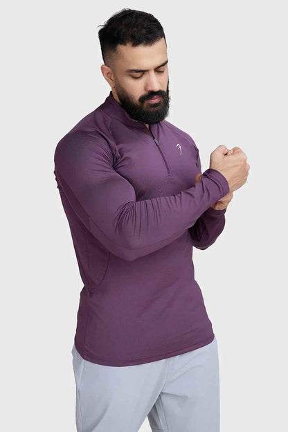 Fuaark Nz Thrive Pullovers Plum T-shirt featuring a relaxed fit and soft fabric in a deep plum color.